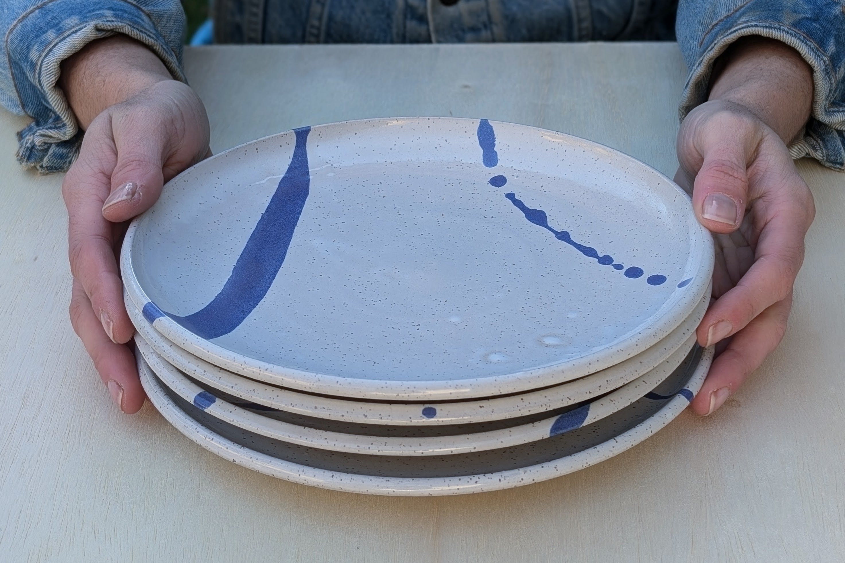 Four Dinner Plates