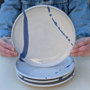 Four Dinner Plates