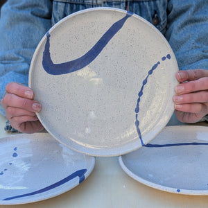 Four Dinner Plates