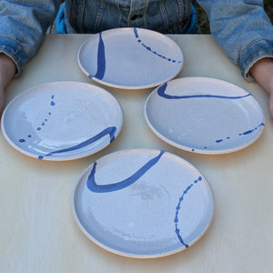 Four Dinner Plates